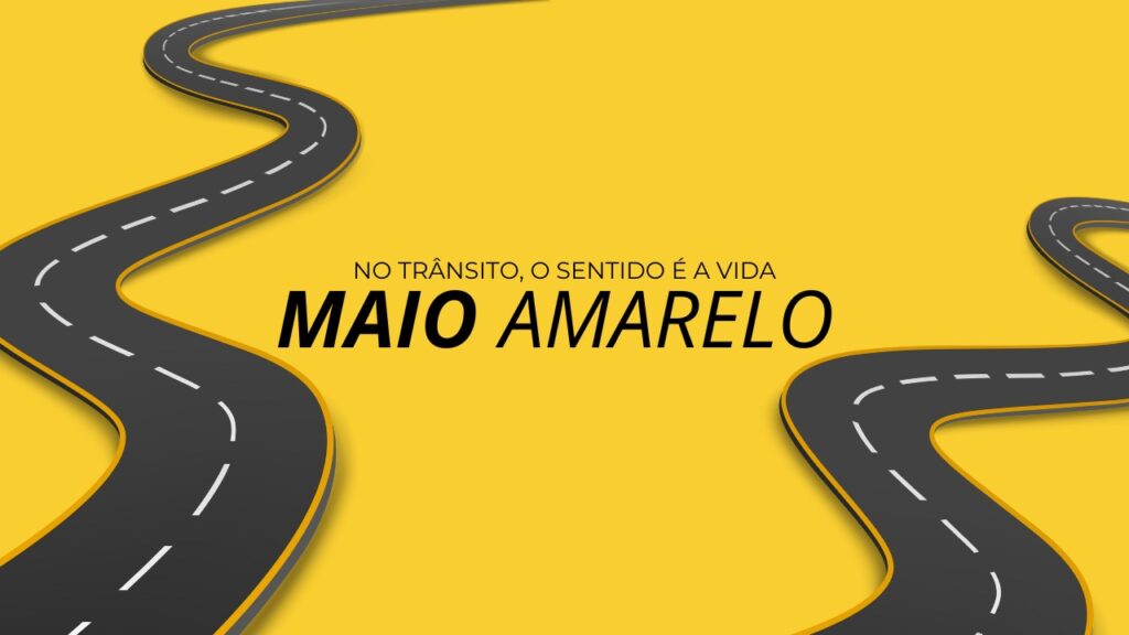 banner-com-fundo-amarelo-escrito-No-trânsito-o-sentido-é-a-vida-maio-amarelo-com-estradas-nas-laterais.jpg