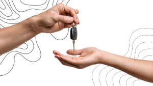 Venda de veículo automotivo. Passando a chave na mão no comprador
